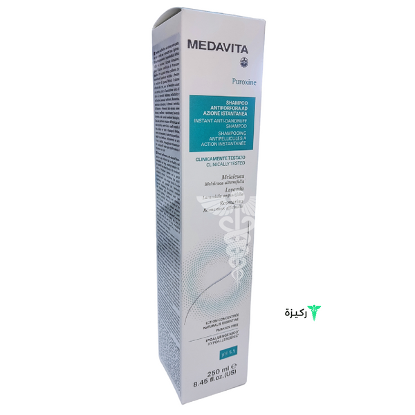 A box of Medavita Puroxine dandruff shampoo, 250ml with a '1+1 free' offer sign.